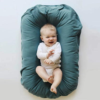 Réducteur de lit bébé BabyNest
