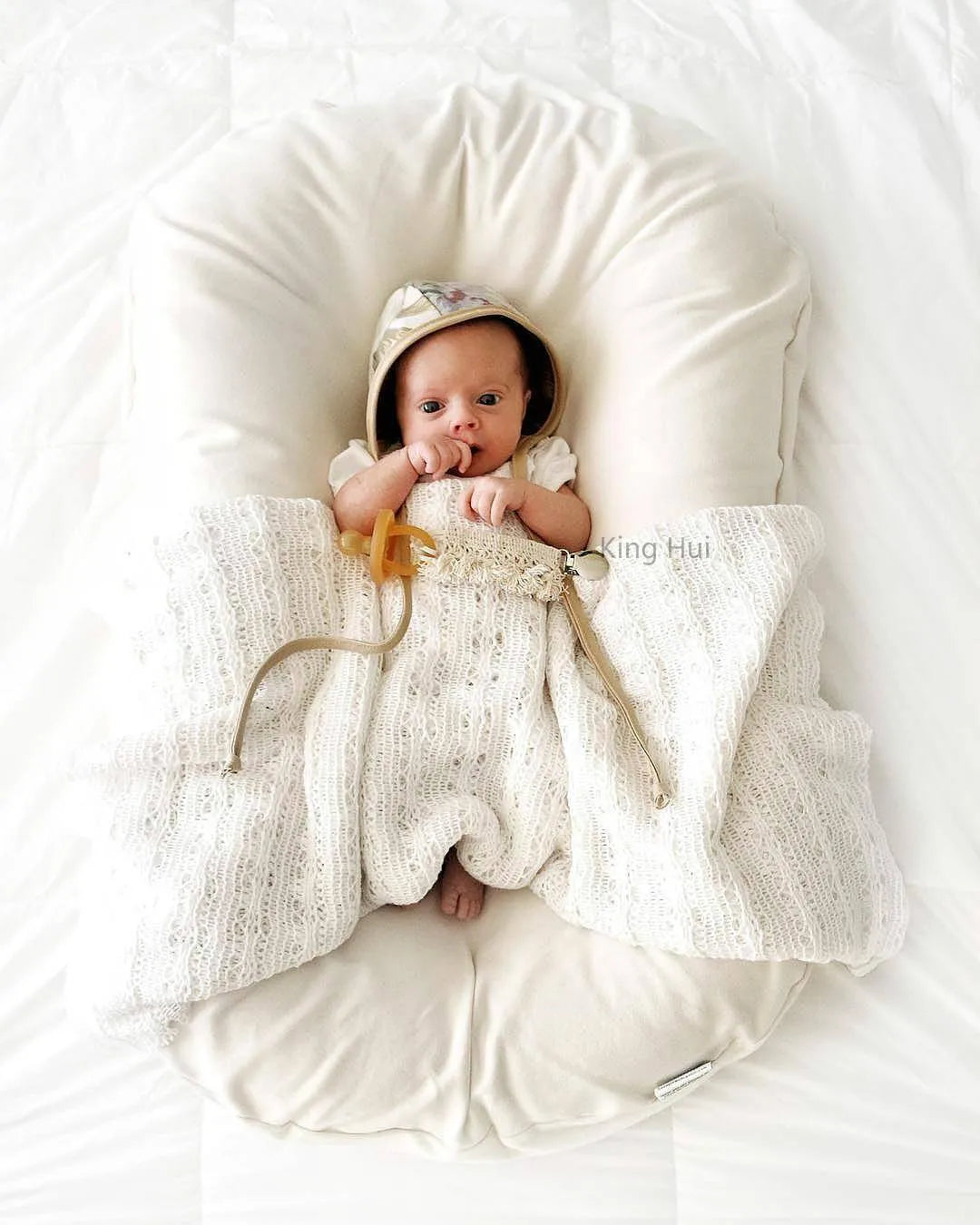 Réducteur de lit bébé BabyNest
