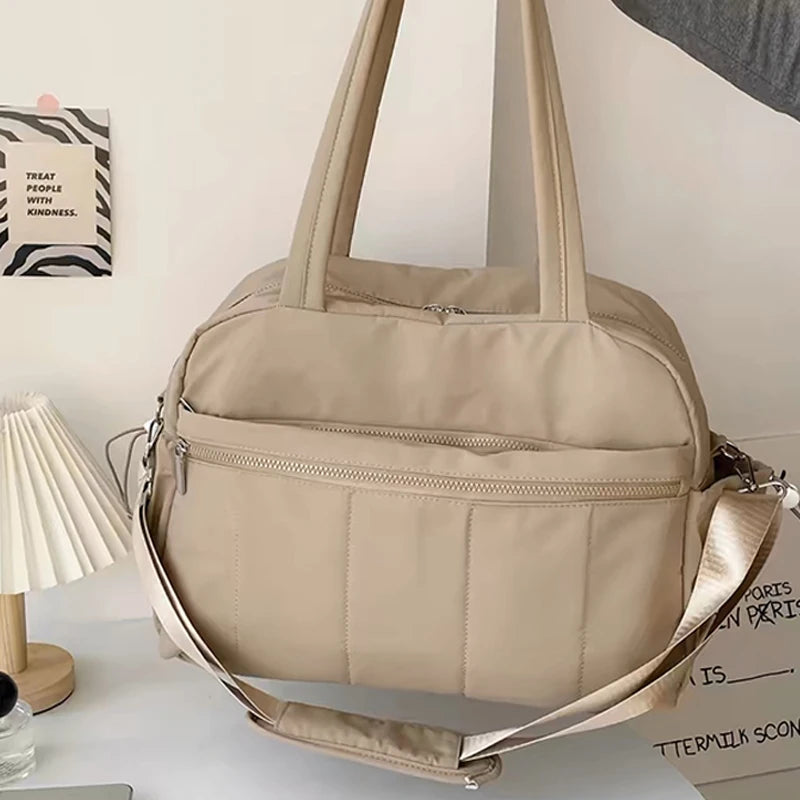 Sac à langer bandoulière doudoune